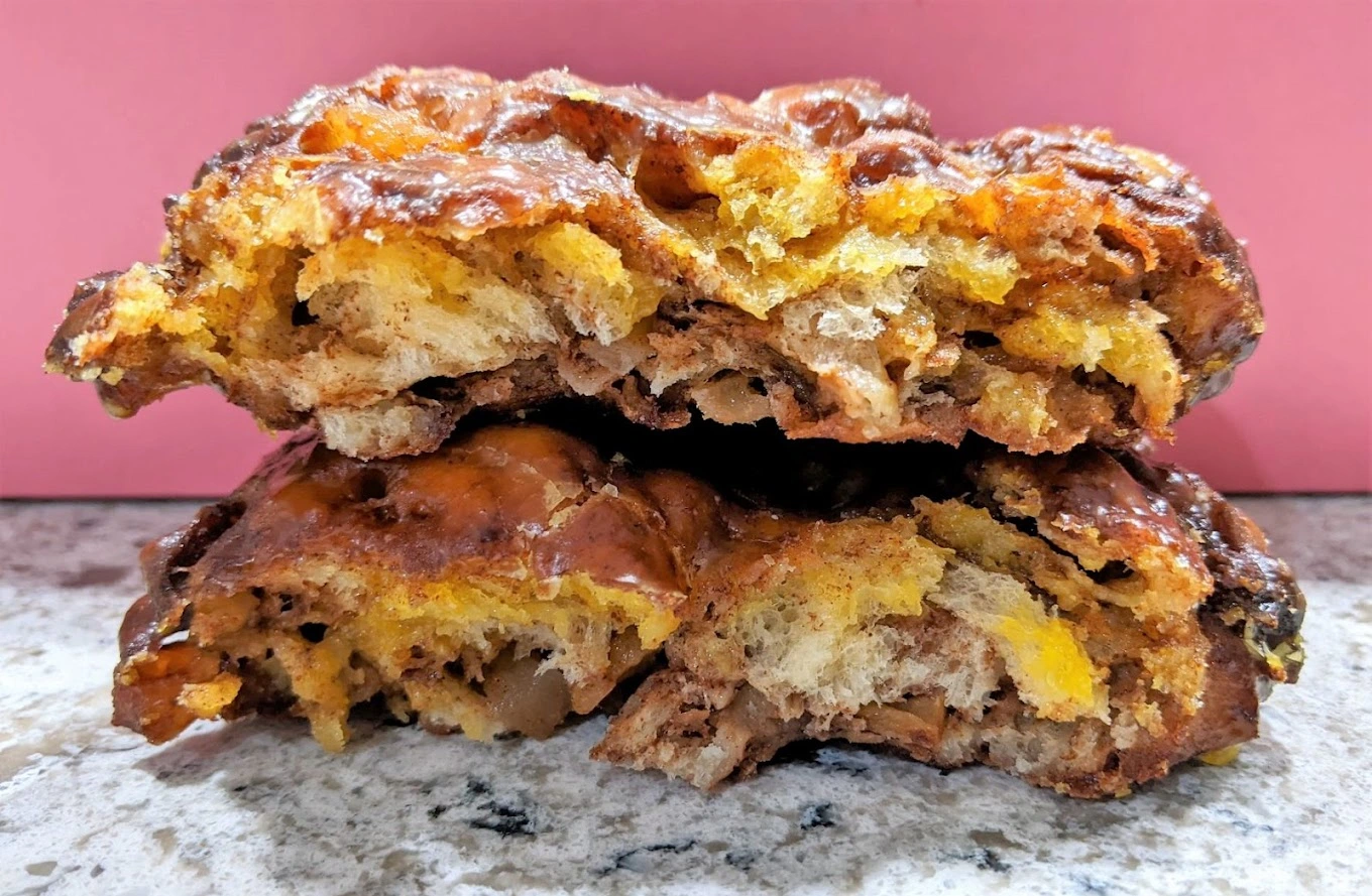 Golden apple fritters fresh from the fryer